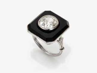 A historical ring decorated with an old-cut diamond and onyx