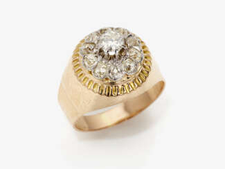 A historical ring decorated with a brilliant cut diamond and diamonds in historical cut form