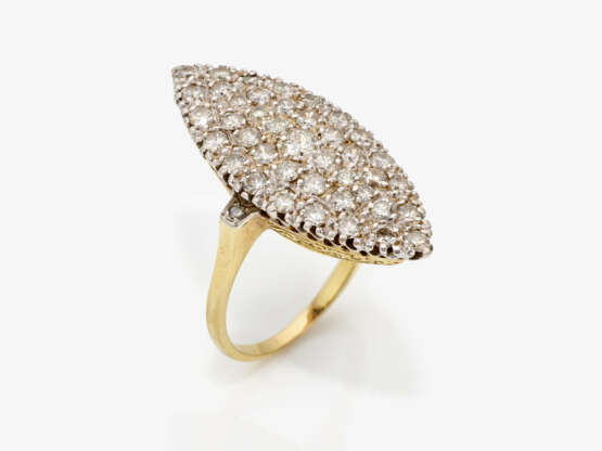 A Marquise ring decorated with brilliant cut diamonds - photo 1