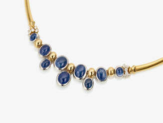 A necklace with sapphire cabochons and brilliant cut diamonds