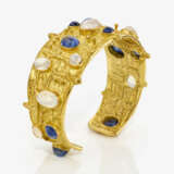A bangle with sapphires and moonstones - photo 1