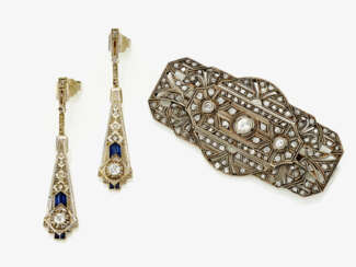 A brooch and pair of diamond drop earrings