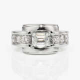 A historical band ring decorated with a baguette cut diamond and brilliant cut diamonds - photo 2