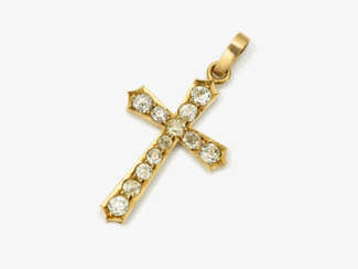 A classic cross pendant decorated with old-cut diamonds