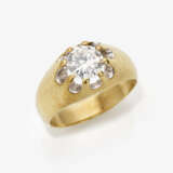 A ring with a brilliant cut diamond - фото 1