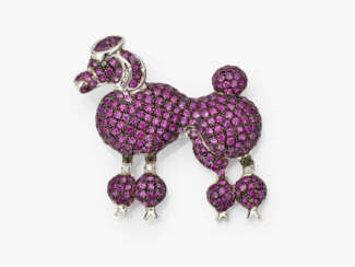 A poodle pendant decorated with pink sapphires and brilliant cut diamonds