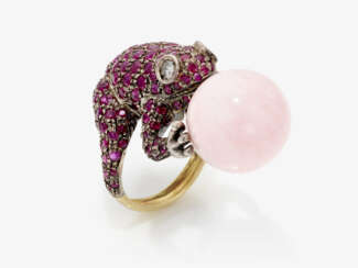 A frog ring with brilliant cut diamonds, rubies and a pink opal