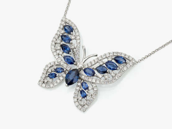 A ''butterfly'' pendant necklace decorated with brilliant cut diamonds and sapphires - фото 1