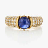 A ring with a sapphire and brilliant cut diamonds - photo 2