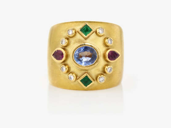 A ring with sapphire, rubies, emeralds and brilliant cut diamonds - фото 1