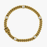 A curb link chain bracelet with brilliant cut diamonds - фото 1
