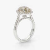 A classic modern cocktail ring decorated with an oval diamond and brilliant cut diamonds - фото 3