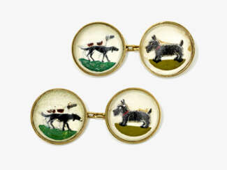 A pair of cufflinks decorated with hounds and Scottish Terriers in ''Essex Crystal''