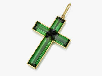 A cross pendant with tourmalines