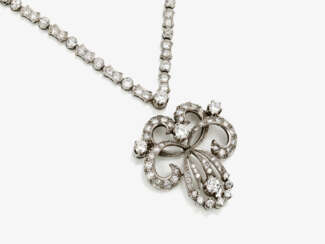 A necklace and pendant with brilliant cut diamonds