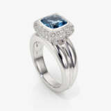 A cocktail ring decorated with an aquamarine and brilliant cut diamonds - фото 1