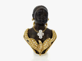 A blackamoor bust brooch made of ebony with gold overlay and diamonds