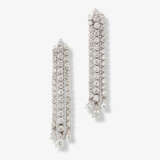 A pair of classical delicate stud earrings decorated with brilliant cut diamonds - photo 1