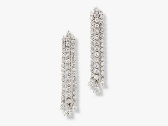 A pair of classical delicate stud earrings decorated with brilliant cut diamonds - фото 1
