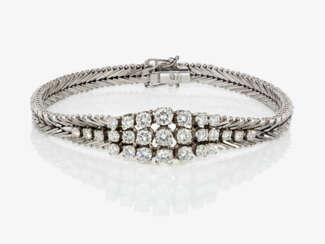 A cocktail bracelet decorated with brilliant cut diamonds