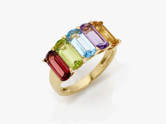 An eternity ring decorated with citrine, amethyst, topaz, peridot and rhodolite - photo 1