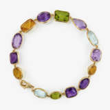 An expressive cocktail bracelet with coloured gemstones - фото 1