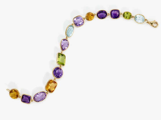An expressive cocktail bracelet with coloured gemstones - фото 2