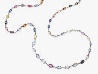 A delicate link necklace decorated with pastel-coloured sapphires