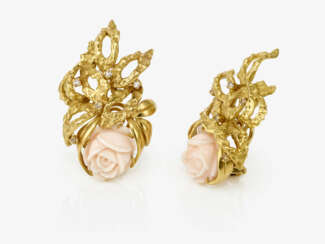 A pair of angel skin coral clip earrings