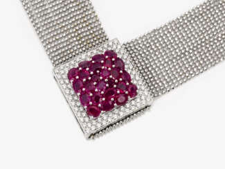 An expressive necklace with vivid to deep red rubies and brilliant cut diamonds
