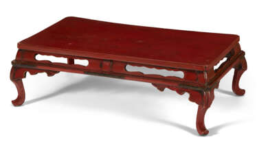 A JAPANESE RED LACQUER LOW TABLE