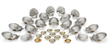 A GROUP OF FORTY-FOUR AMERICAN SILVER AND SILVER-GILT SHELL-FORM DISHES