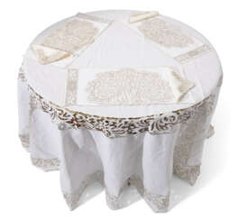 A SUITE OF CUTWORK EMBROIDERED TABLE LINENS