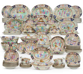 AN UNUSUAL CHINESE EXPORT PORCELAIN 'CANTON FAMILLE-ROSE' PART DINNER SERVICE