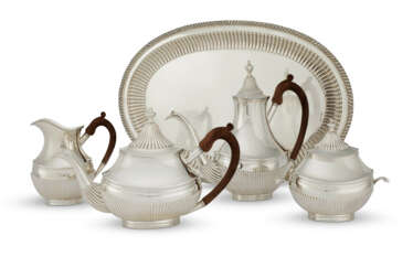 A PORTUGUESE SILVER FOUR-PIECE TEA AND COFFEE SERVICE AND SIMILAR TRAY