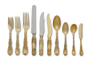 AN AMERICAN SILVER-GILT FLATWARE SERVICE