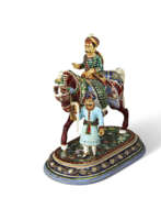 Джайпур. A STONE-INLAID GILT AND ENAMELED METAL FIGURE OF A MAHARAJA ON HORSEBACK