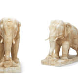 A PAIR OF FINELY CARVED WHITE MARBLE ELEPHANTS - фото 1