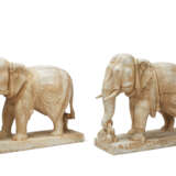 A PAIR OF FINELY CARVED WHITE MARBLE ELEPHANTS - фото 2