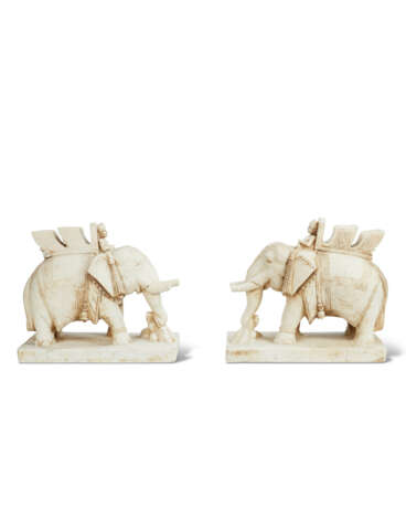 A PAIR OF WHITE MARBLE FIGURES OF ELEPHANTS - photo 2