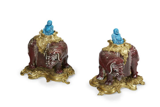 A PAIR OF FRENCH ORMOLU-MOUNTED CHINESE SANG-DE-BOEUF PORCELAIN ELEPHANTS - photo 1