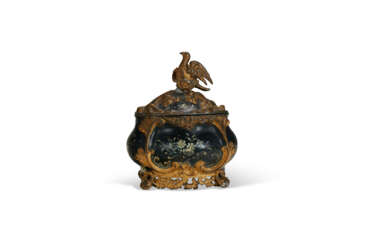 A NORTH EUROPEAN PARCEL-GILT AND POLYCHROME-DECORATED TOLE TEA CADDY