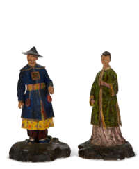 A PAIR OF PAINTED PLASTER FIGURES