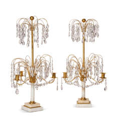 A PAIR OF SWEDISH CUT-GLASS-MOUNTED ORMOLU AND WHITE MARBLE THREE-LIGHT CANDELABRA
