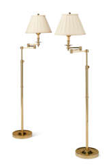 A PAIR OF POLISHED BRASS SWING ARM FLOOR LAMPS