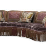 A BUTTON-TUFTED LILAC GROUND CURVED FIVE-SEAT SOFA - photo 2