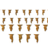 A GROUP OF TWENTY-EIGHT GILTWOOD AND GILT-COMPOSITION WALL BRACKETS - photo 1