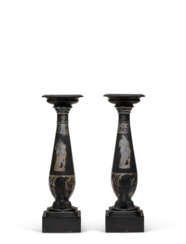 A PAIR OF VICTORIAN ENGRAVED BLACK DERBYSHIRE MARBLE CANDLESTICKS 