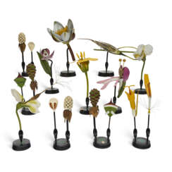 A GROUP OF CARVED WOOD MODELS OF FLOWERS