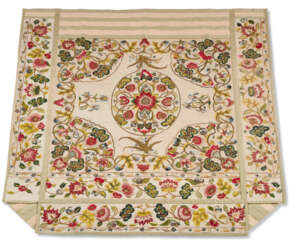 AN ENGLISH SILK EMBROIDERED AND QUILTED LINEN COVERLET WITH ATTACHED VALANCES